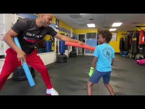FUN BOXING DRILL TO WORK WITH YOUR CHILD TO BUILD BETTER REFLEX. ELITE BOXING FITNESS CENTER.