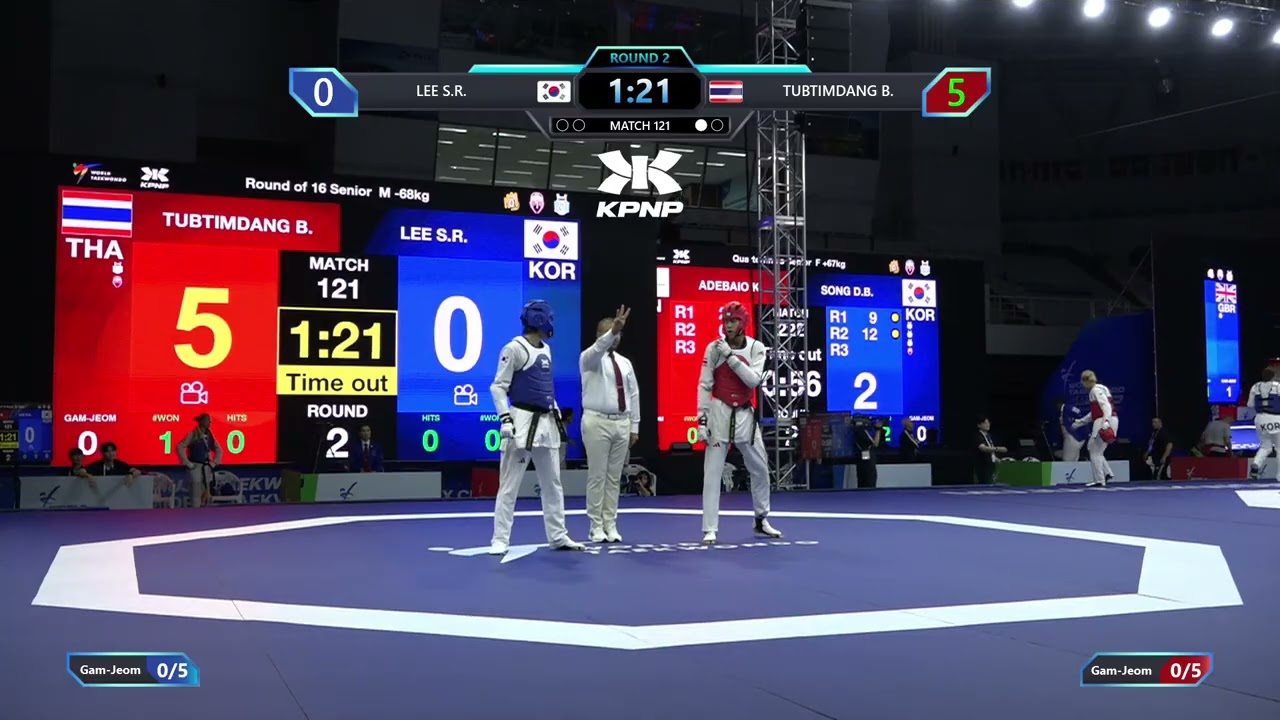 121 Round of 16 M 68kg KOR LEE S R THA TUBTIMDANG B PGM background