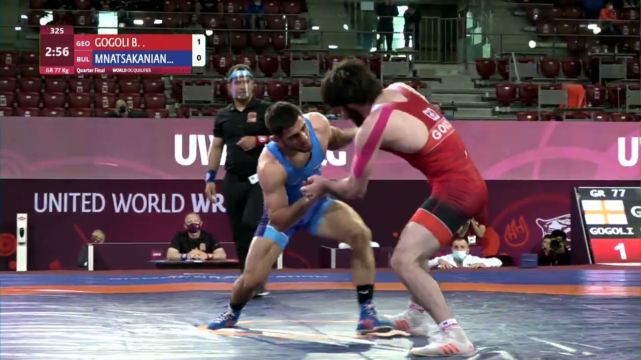 1/4 GR - 77 kg: B. GOGOLI (GEO) v. A. MNATSAKANIAN (BUL) background