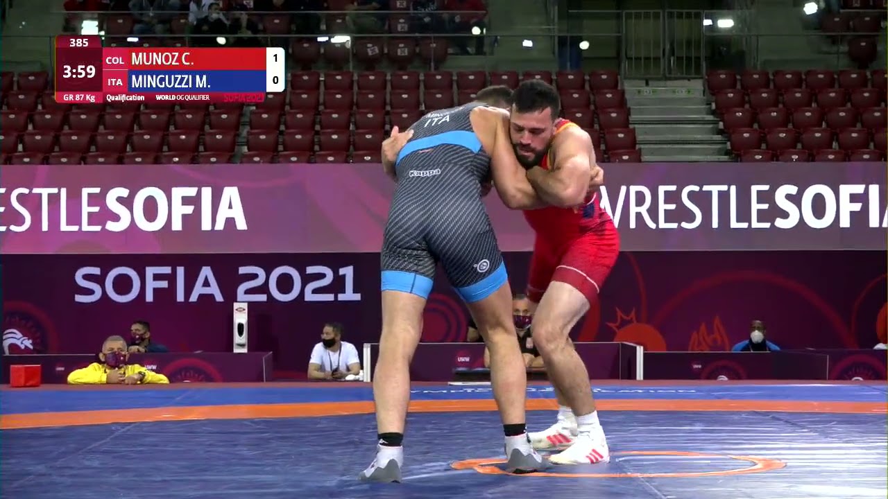 Qual. GR - 87 kg: C. MUNOZ JARAMI (COL) v. M. MINGUZZI (ITA) background