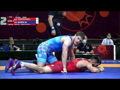 1/4 GR - 87 kg: G. TADEVOSYAN (ARM) v. M. MANDIC (CRO) background
