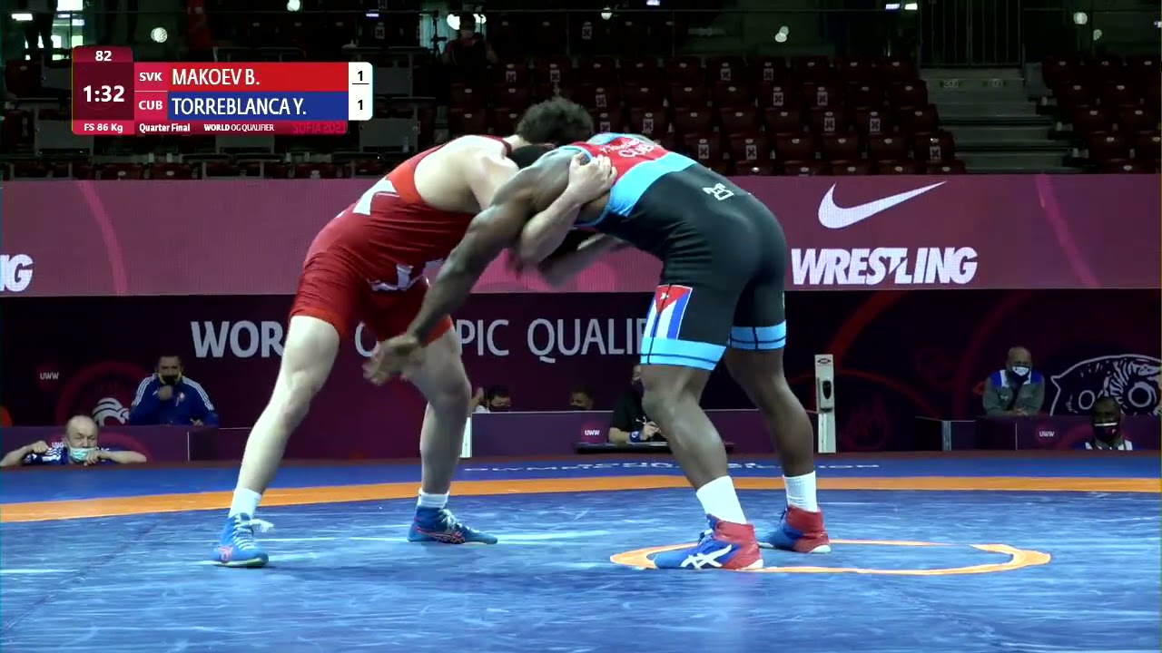 1/4 FS - 86 kg: B. MAKOEV (SVK) v. Y. TORREBLANCA (CUB) background