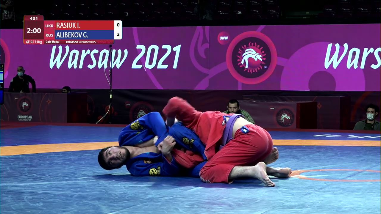 GOLD Men's GP Gi - 71 kg: I. RASIUK (UKR) v. G. ALIBEKOV (RUS) background