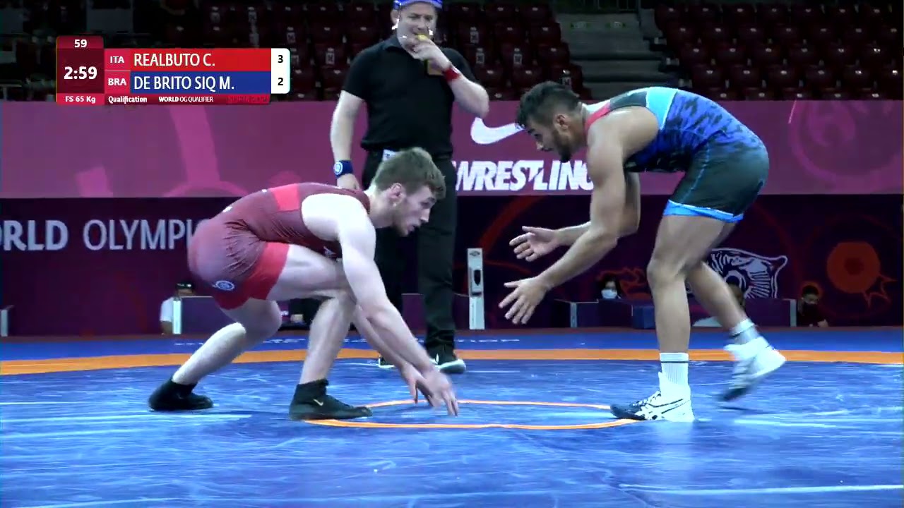 Qual. FS - 65 kg: C. REALBUTO (ITA) v. M. DE BRITO SIQ (BRA) background