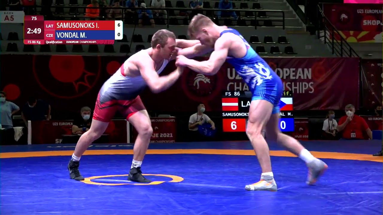 Qual. FS - 86 kg: I. SAMUSONOKS (LAT) v. M. VONDAL (CZE) background