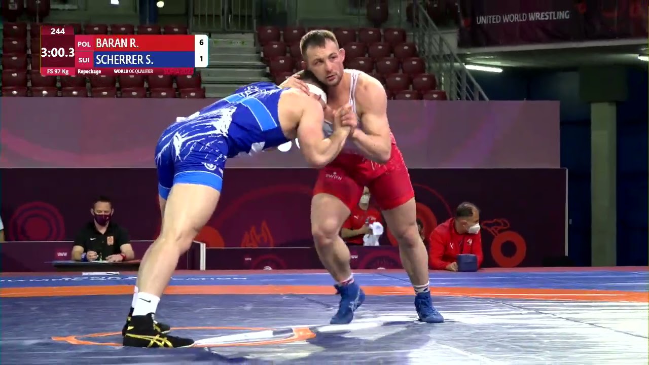 Repechage FS - 97 kg: R. BARAN (POL) v. S. SCHERRER (SUI) background