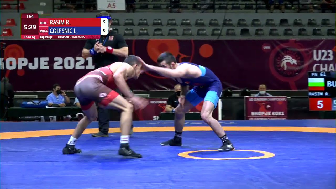 Repechage FS - 61 kg: R. RASIM (BUL) v. L. COLESNIC (MDA) background