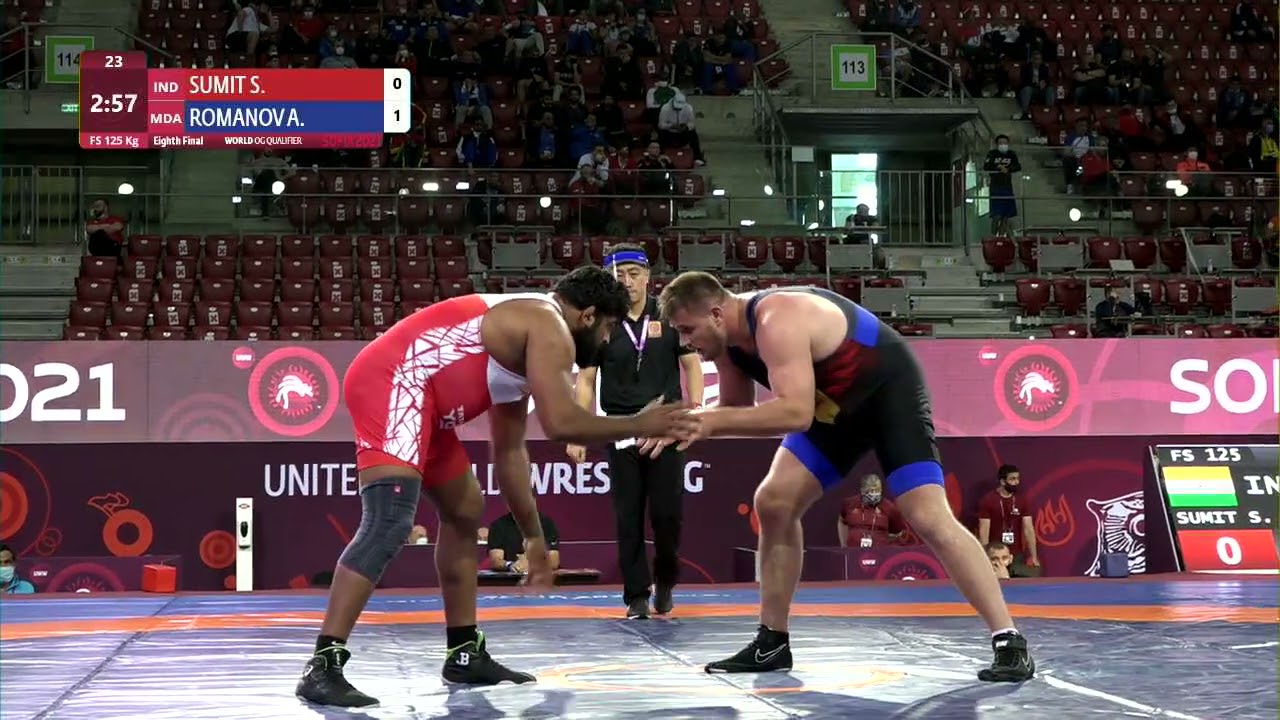 1/8 FS - 125 kg: S. SUMIT (IND) v. A. ROMANOV (MDA) background
