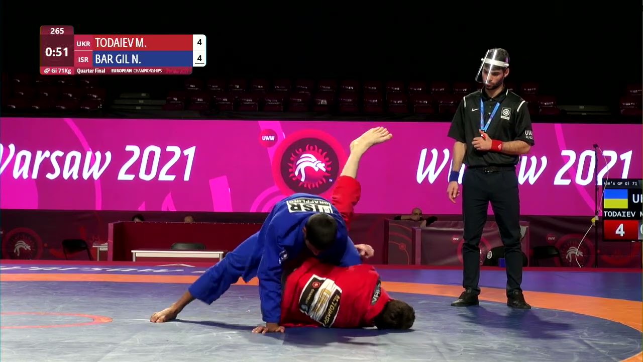 1/4 Men's GP Gi - 71 kg: M. TODAIEV (UKR) v. N. BAR GIL (ISR) background