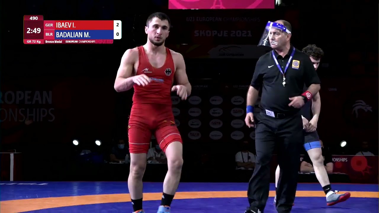 BRONZE GR - 72 kg: I. IBAEV (GER) v. M. BADALIAN (BLR) background