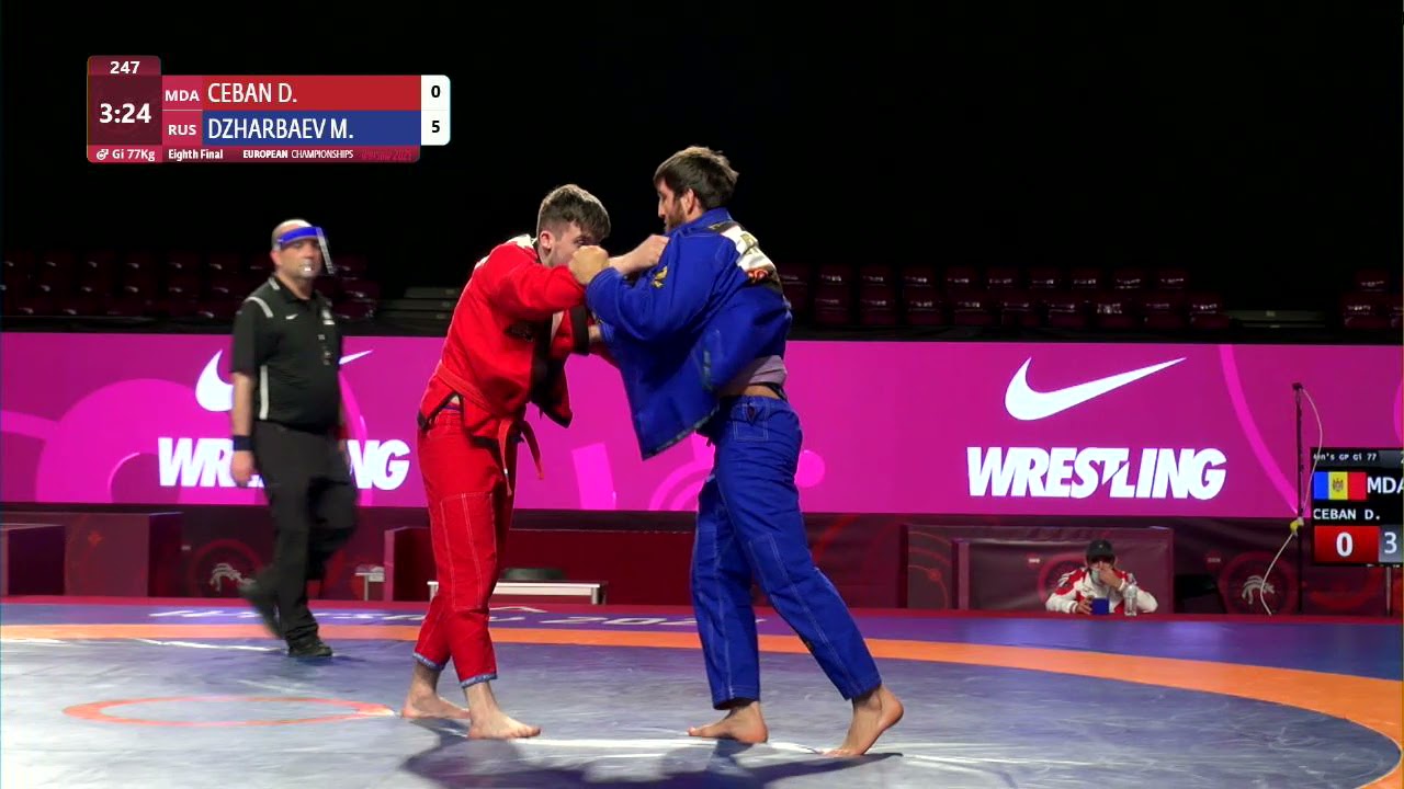 1/8 Men's GP Gi - 77 kg: D. CEBAN (MDA) v. M. DZHARBAEV (RUS) backdrop
