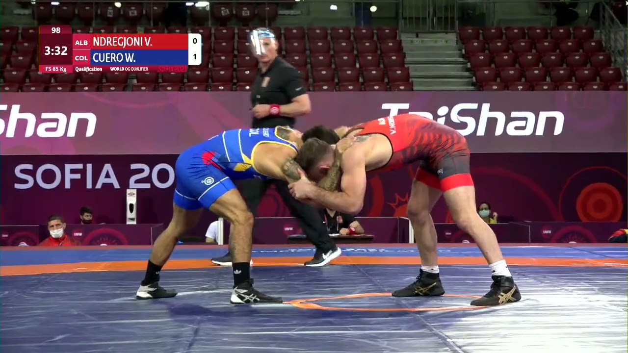 Qual. FS - 65 kg: V. NDREGJONI (ALB) v. W. CUERO MUNOZ (COL) background