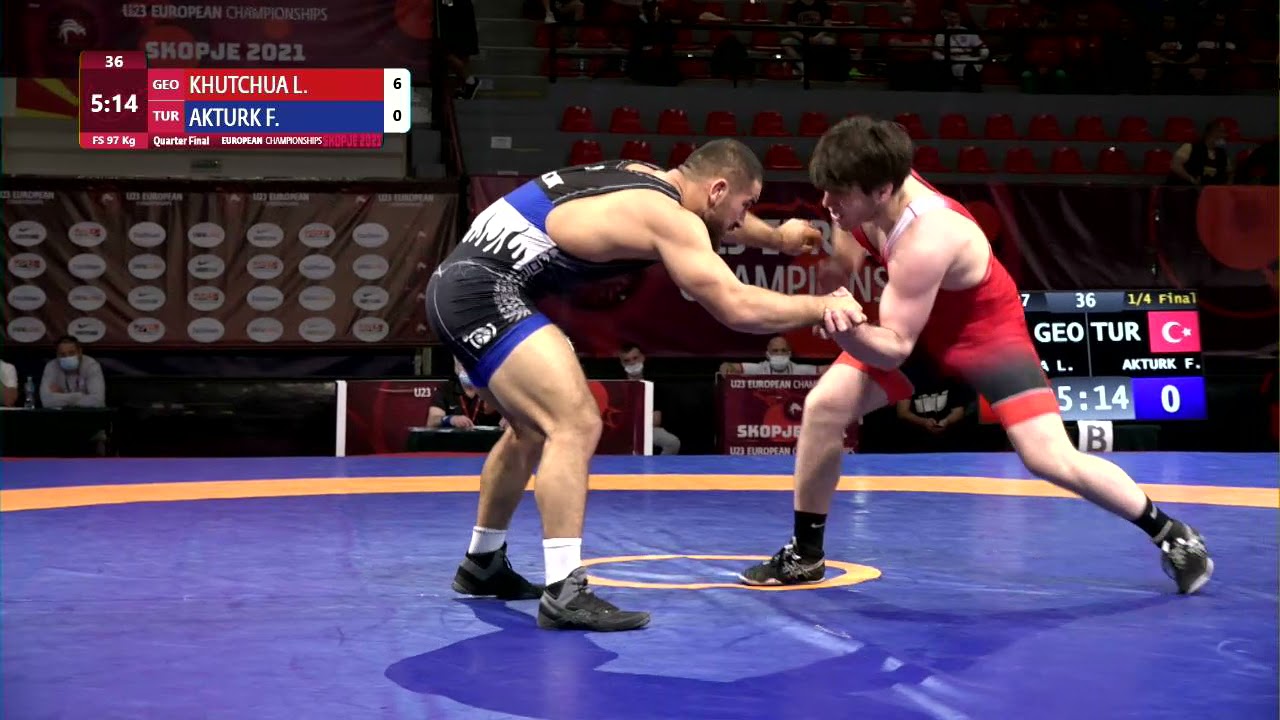 1/4 FS - 97 kg: L. KHUTCHUA (GEO) v. F. AKTURK (TUR) background