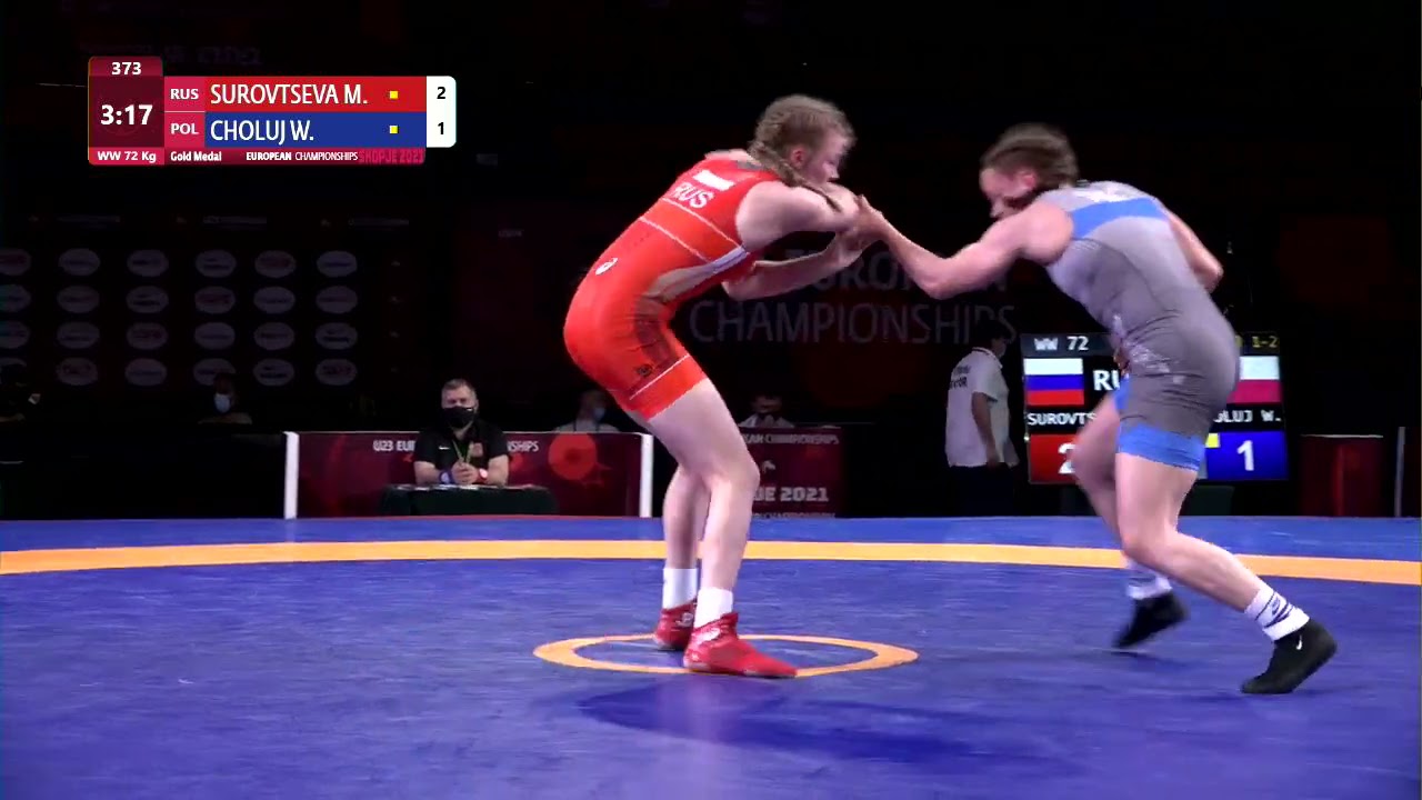 GOLD WW - 72 kg: M. SUROVTSEVA (RUS) v. W. CHOLUJ (POL) background