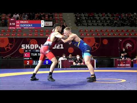 1/2 GR - 77 kg: E. ERGEN (TUR) v. P. OLOFSSON (SWE) background