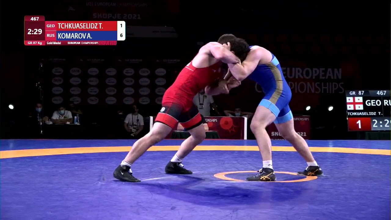 GOLD GR - 87 kg: T. TCHKUASELIDZ (GEO) v. A. KOMAROV (RUS) background