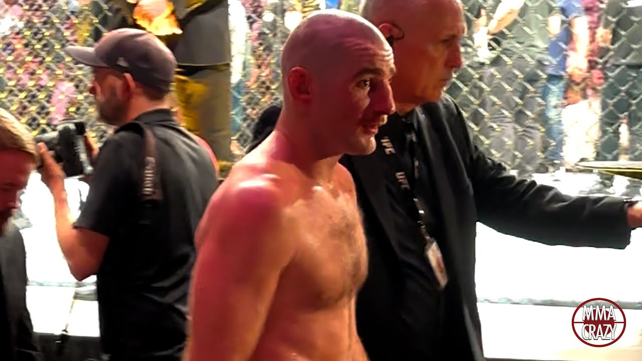 Sean Strickland leaves with BROKEN NOSE after loss to Dricus Du Plessis at UFC 312 background