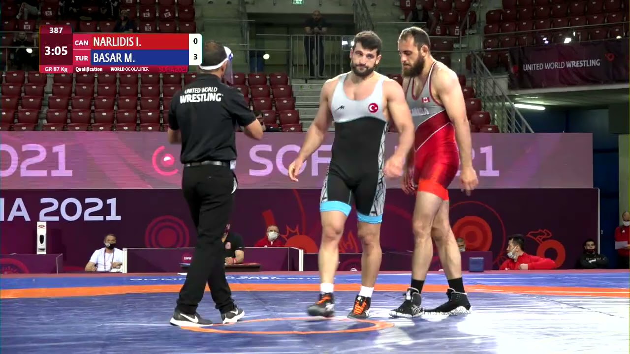Qual. GR - 87 kg: I. NARLIDIS (CAN) v. M. BASAR (TUR) background