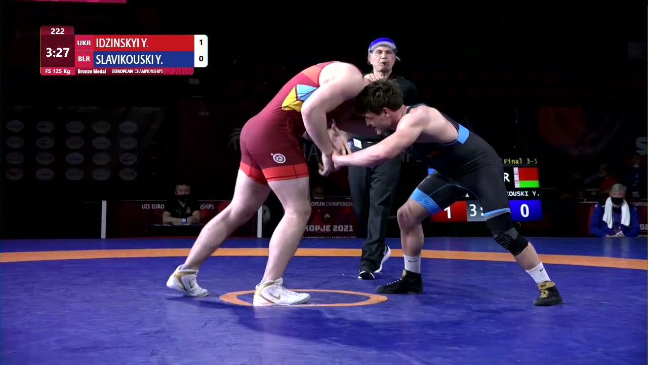 BRONZE FS - 125 kg: Y. IDZINSKYI (UKR) v. Y. SLAVIKOUSKI (BLR) background