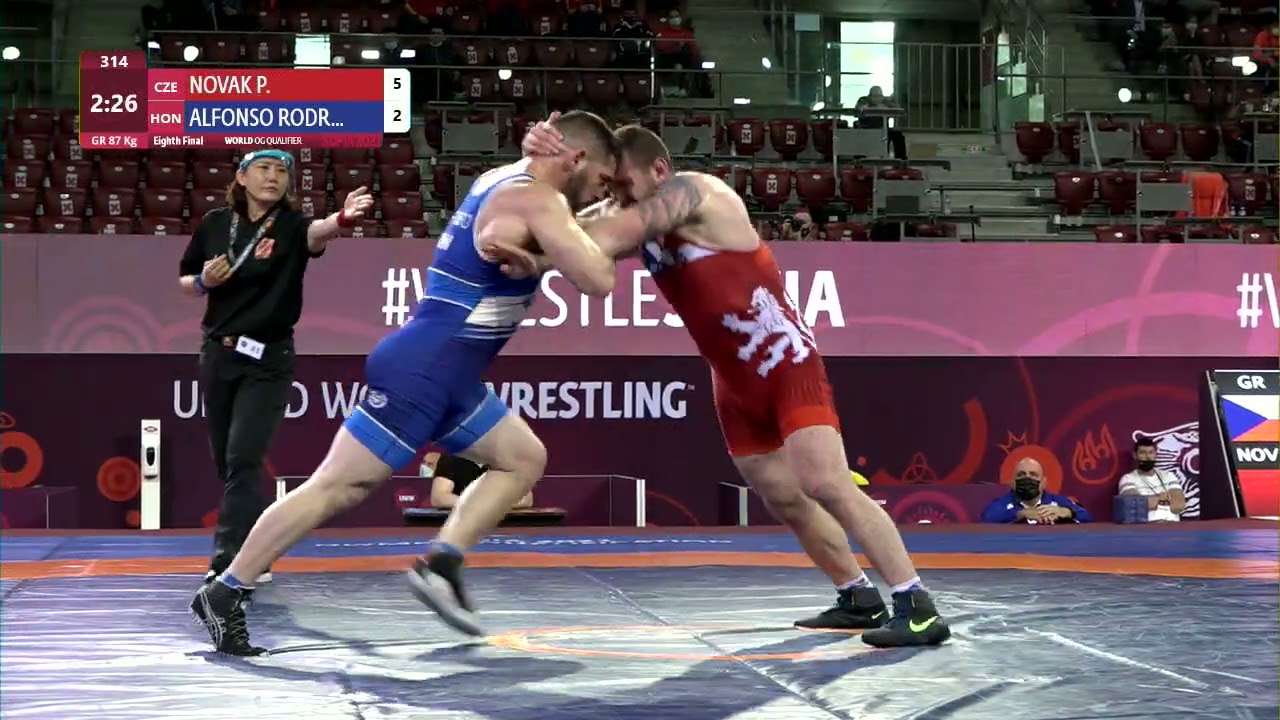 1/8 GR - 87 kg: P. NOVAK (CZE) v. A. ALFONSO RODR (HON) background