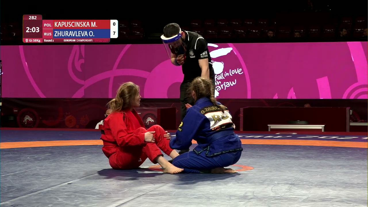 Round 2 Women's GP GI - 58 kg: M. KAPUSCINSKA (POL) v. O. ZHURAVLEVA (RUS) background