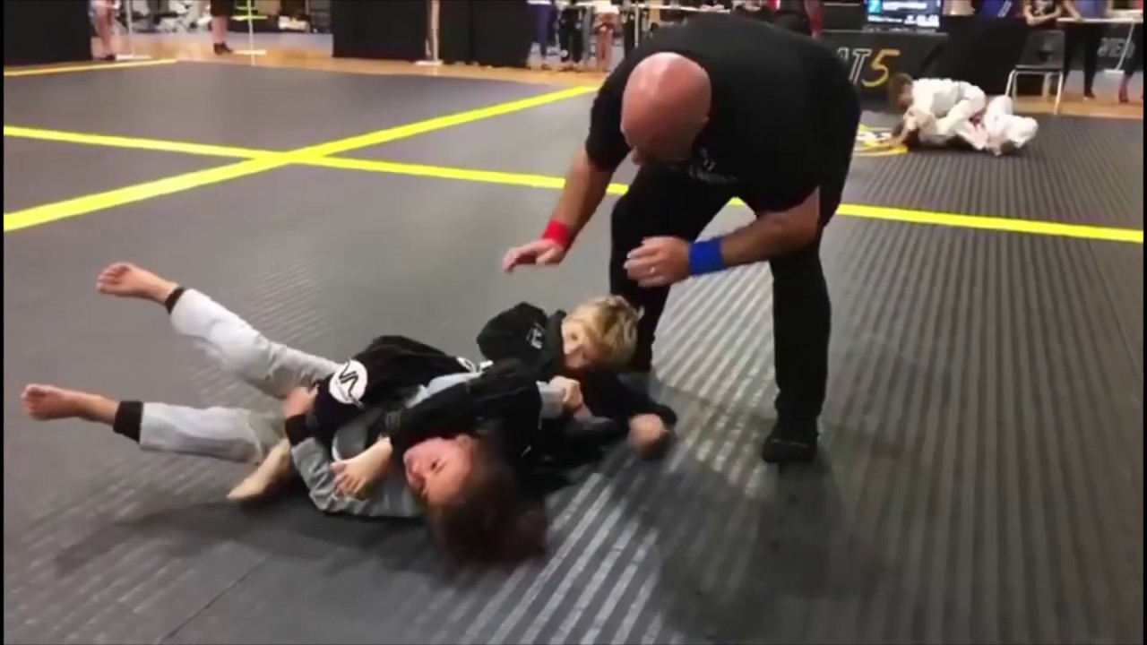 Russian kid wins 8 straight BJJ fights in the USA background