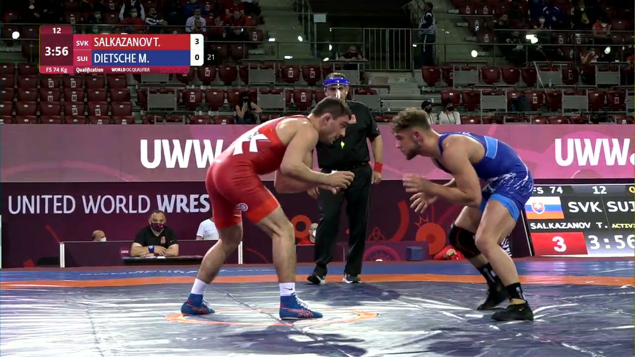 Qual. FS - 74 kg: T. SALKAZANOV (SVK) v. M. DIETSCHE (SUI) background