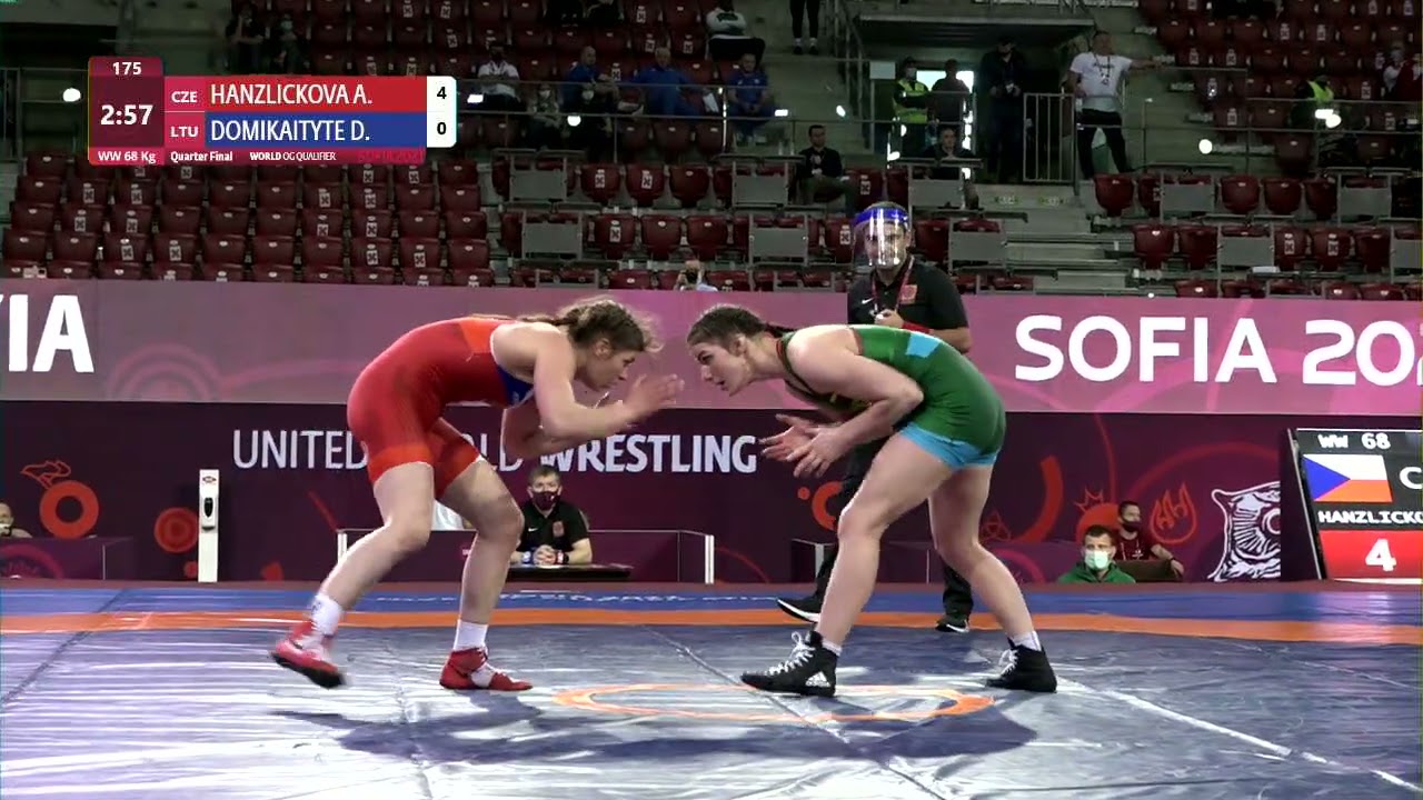 1/4 WW - 68 kg: A. HANZLICKOVA (CZE) v. D. DOMIKAITYTE (LTU) background