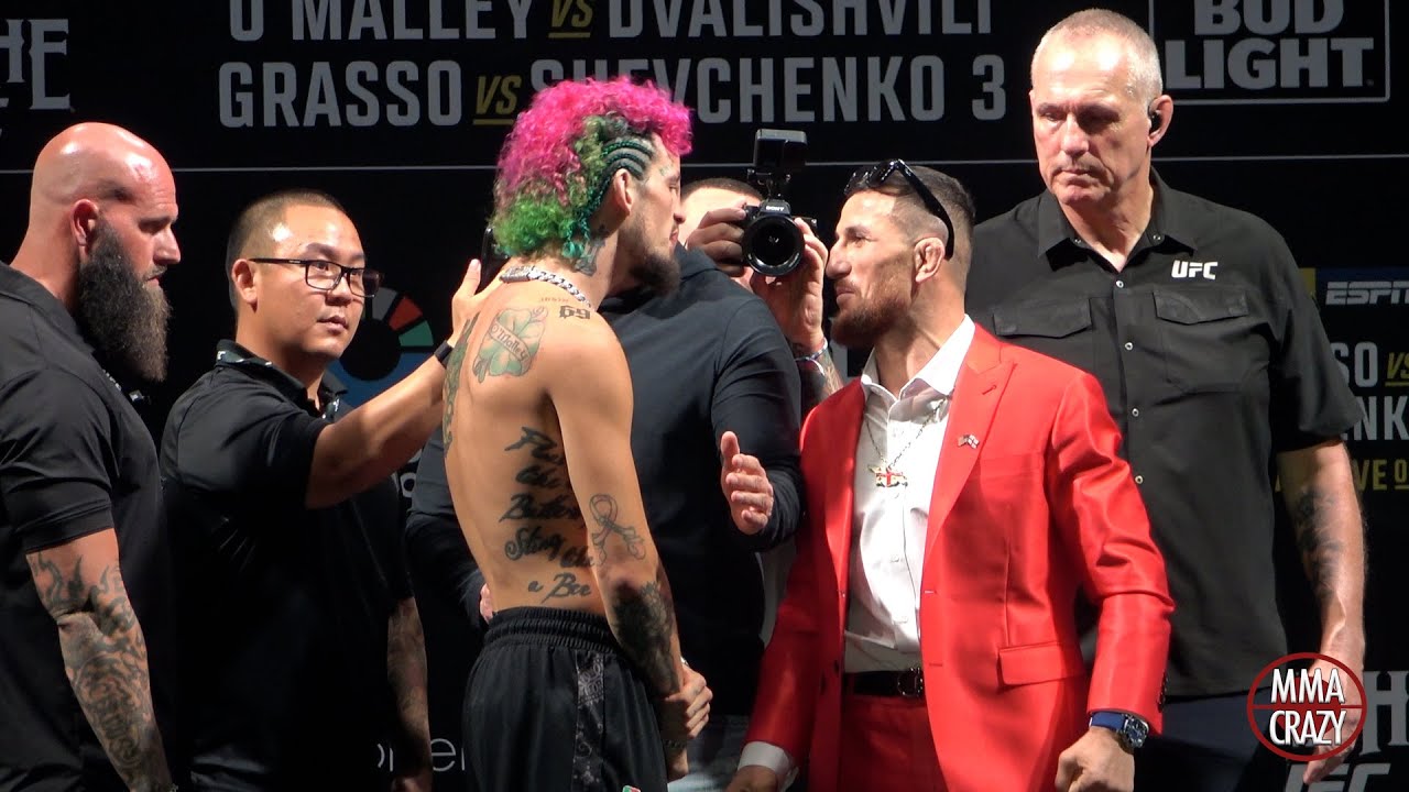 Sean O’Malley & Merab Dvalishvili ARGUE Face Off for UFC 306 background