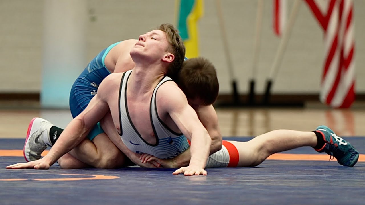 Artur Jeremejev (EST) vs Tuukka Peltokangas (FIN) 67kg. Greco-roman men wrestling. background