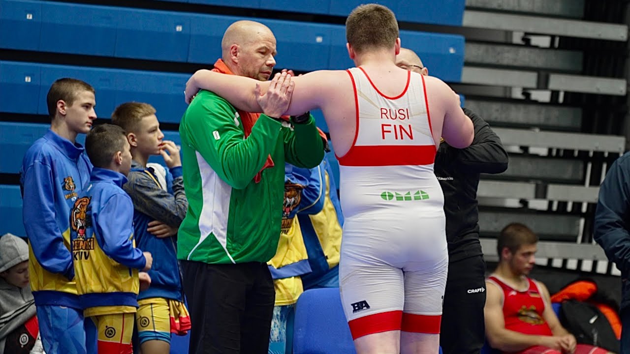 U17 R. Rusi (FIN) vs K. Pallon (EST) 110kg. Youth boys greco-roman wrestling. background