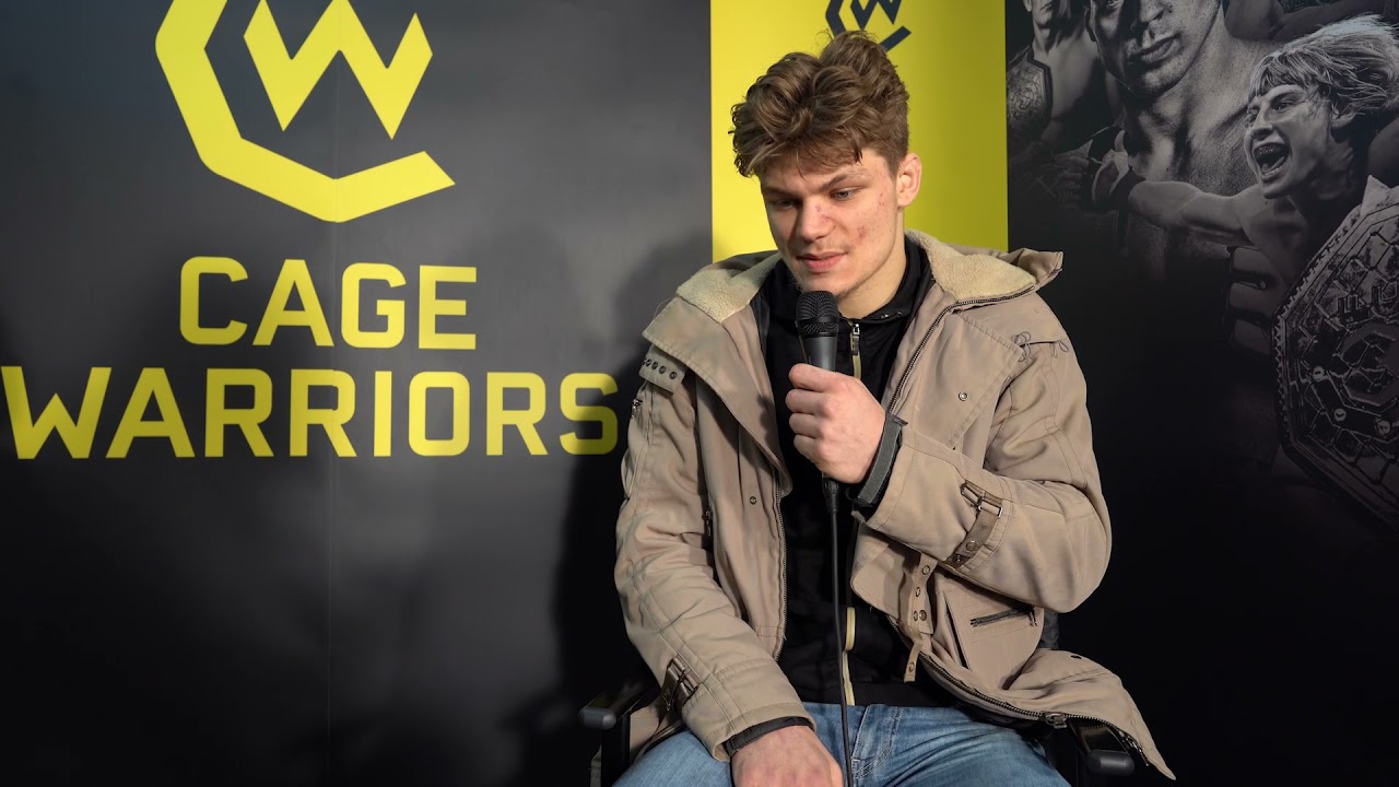 Edith Labelle talks to his Will Currie after his controversial loss at CW120 background