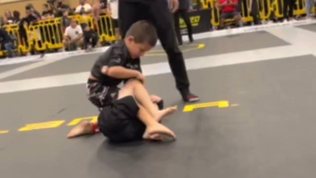 4 years old training half-guard for 2 weeks backdrop