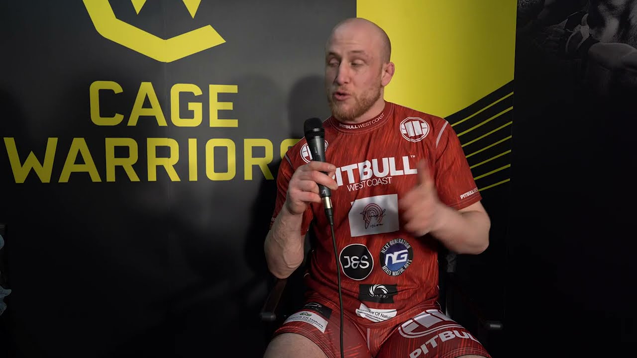 Edith Labelle speaks to Matt Bonner after his KO win at CW 121 background