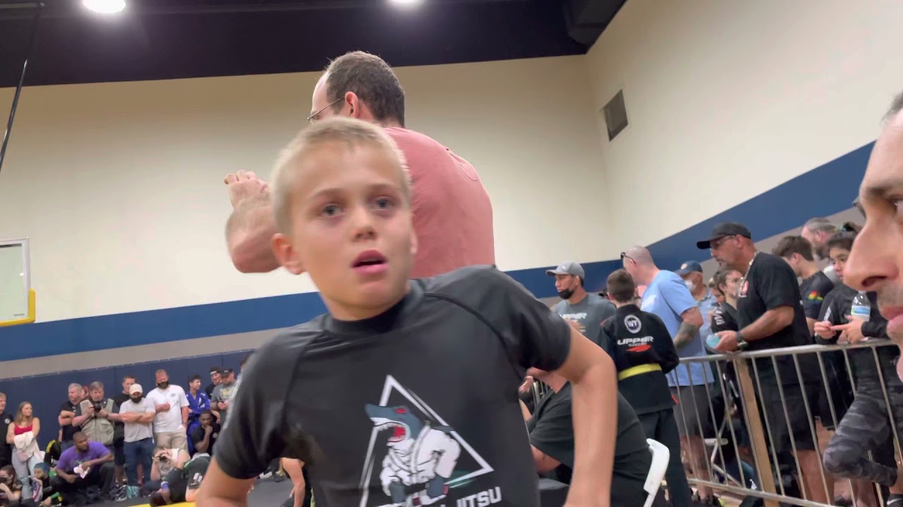 Coach asks for a Kimura before match and kid does it! backdrop