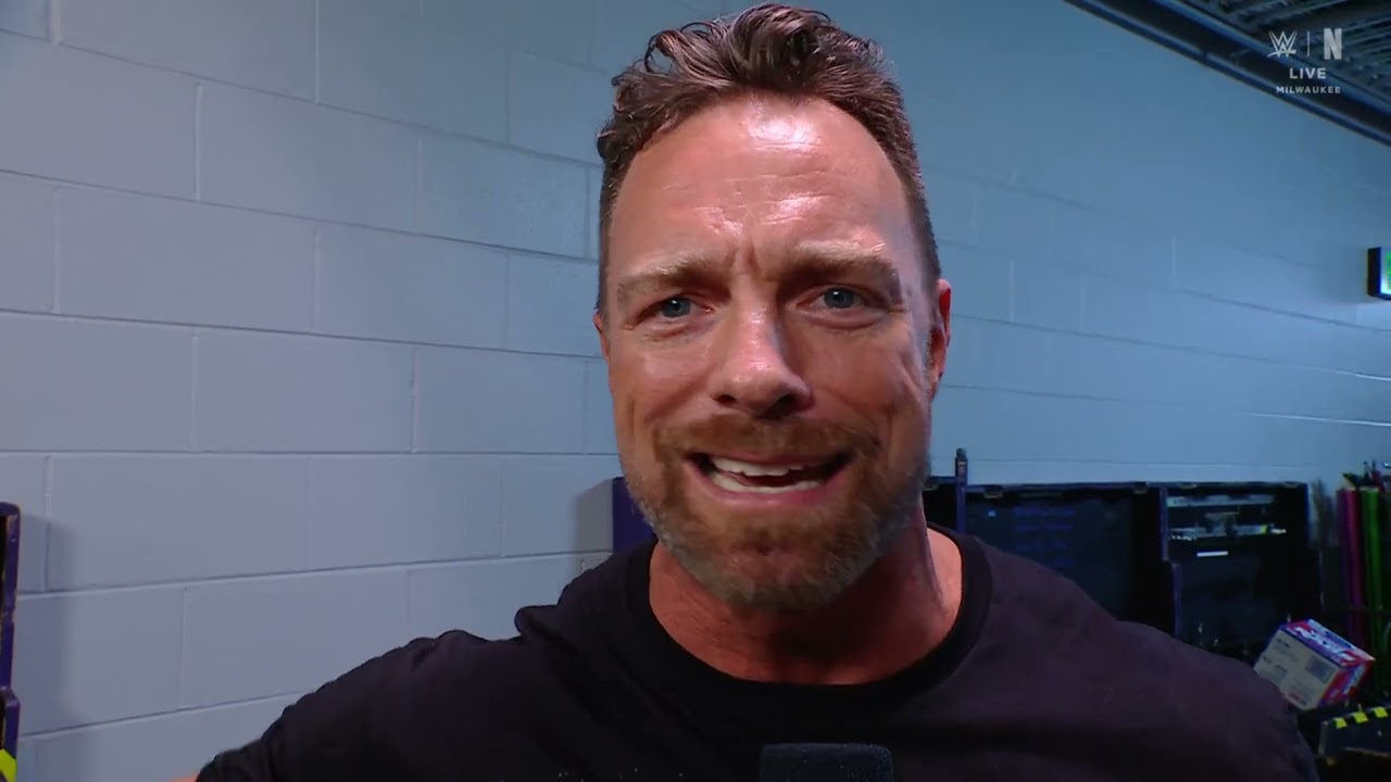 LA Knight is having a heated conversation with Adam Pearce | Raw Sep 8, 2025 background
