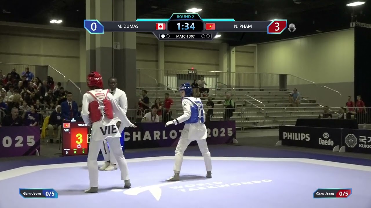 307 Round of 64 W 57kg CAN M DUMAS VIE N PHAM PGM background