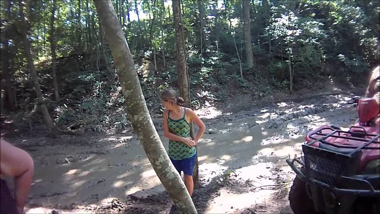 Two friends get into a friendly mud-wrestling cat-fight in the Mud-Pits at Sandtown Ranch