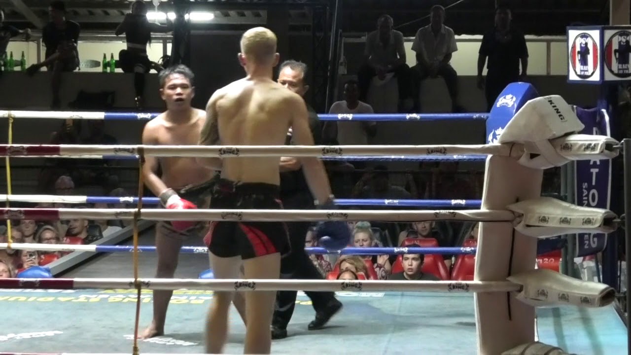 Tucker (Sinbi Muay Thai) from the U.S.A. fights at Patong Stadium and wins by K.O. in Round 4 background