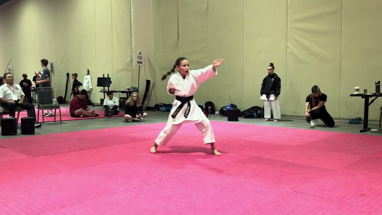 Madalynn Wiersma 13 and Under Girls Traditional Forms Grand Championship - US Capitol Classics background