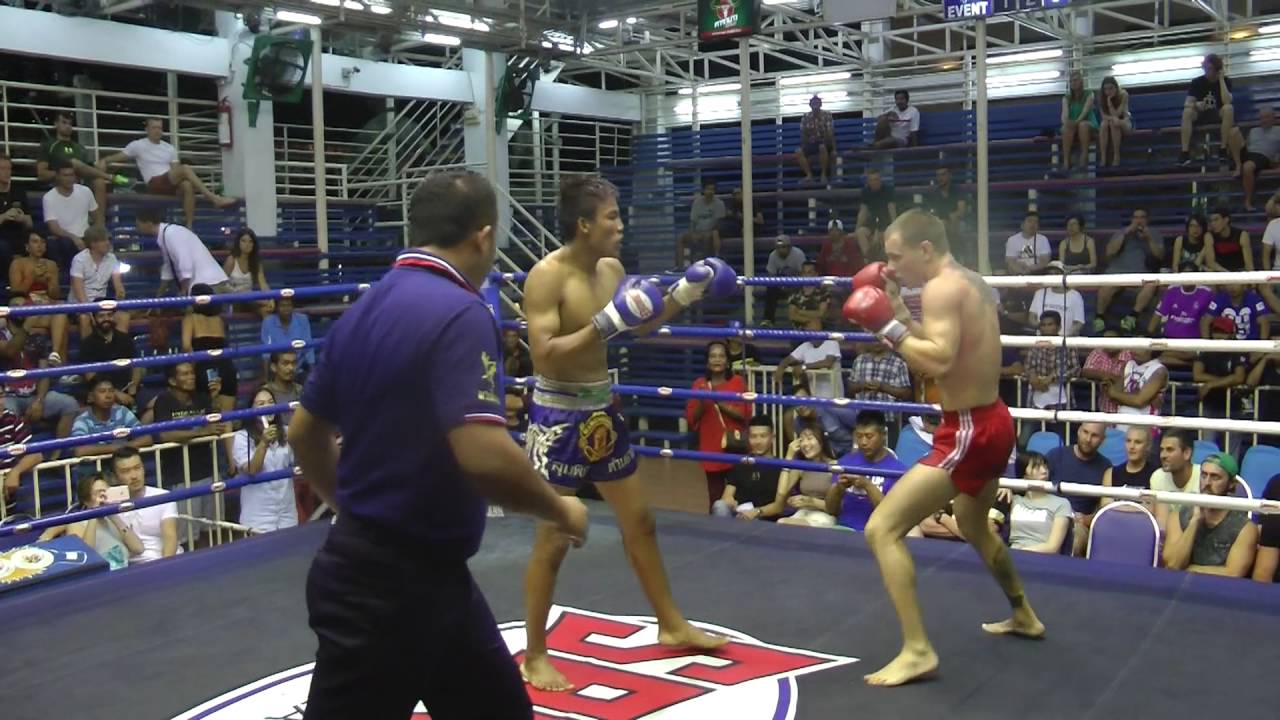 Hubert from Poland (Red corner- Sinbi Muay Thai) fights at Bangla Stadium- 28.8.2016 background
