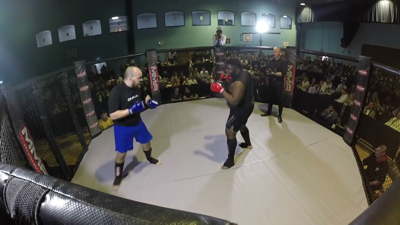 Windsor | ULTRA MMA | ELIJAH MALCOLM OGBEMUDIA VS STEPHEN THE THUNDER CURRIE background