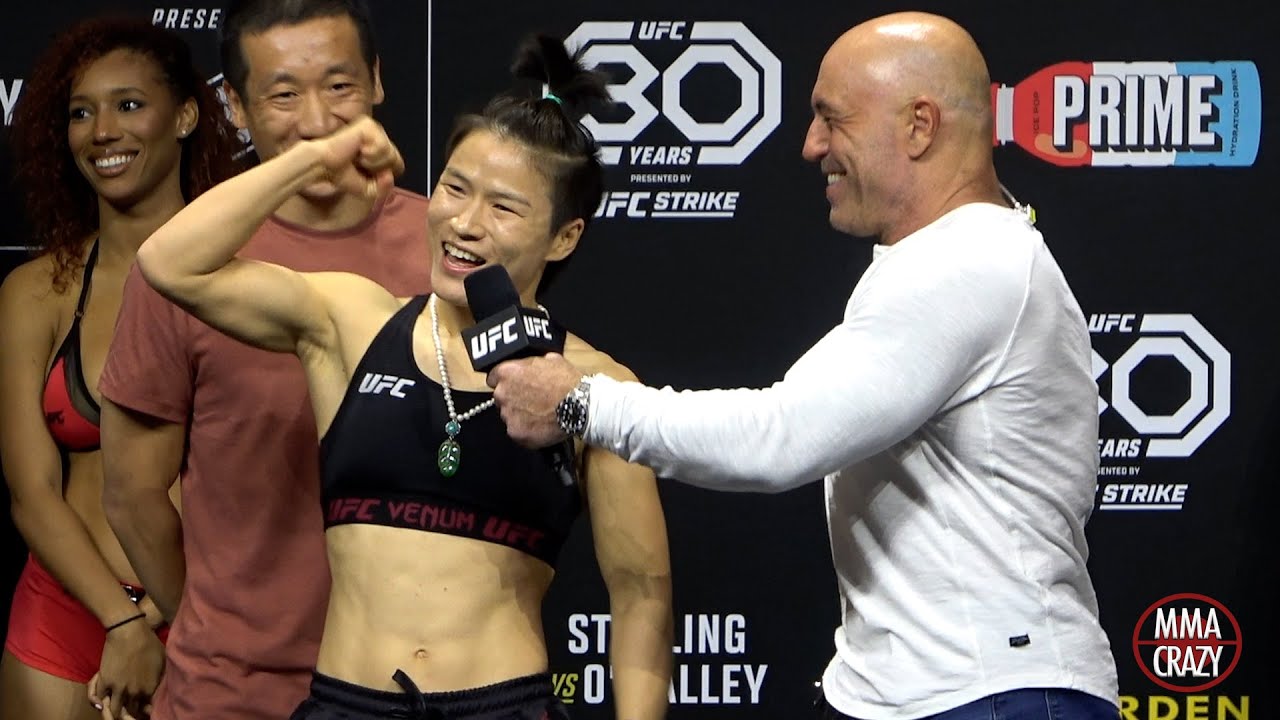 Weili Zhang shocks Joe Rogan & Crowd with her English at UFC 292 weigh ins "Whats up Boston" background