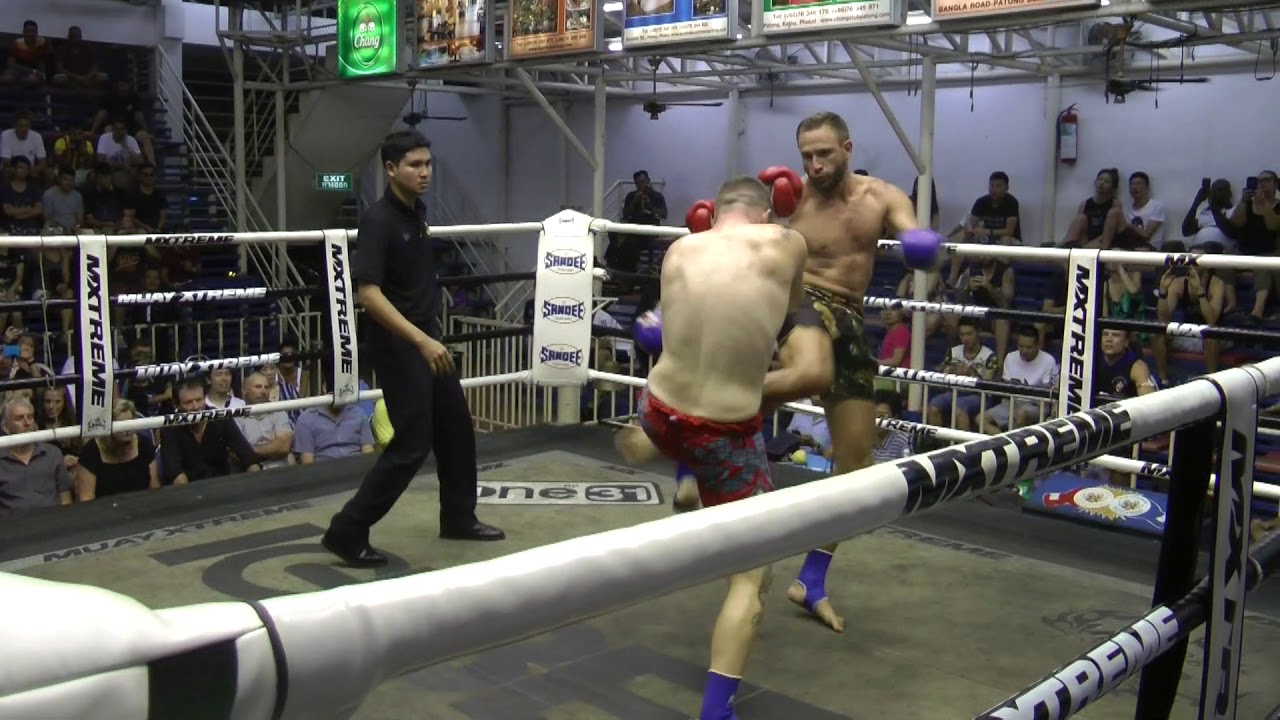 Johnny from Australia (Red corner/Sinbi Muay Thai) fights at Bangla Stadium- 8/2017
