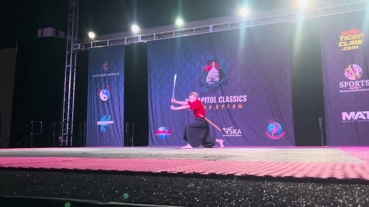 Adomas Rackauskas 13 and Under Boys Weapons Overall Grand Championship - US Capitol Classics background