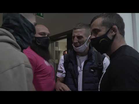 Oban Elliott and Mike Figlak clash in the Cage Warriors fighter hotel background