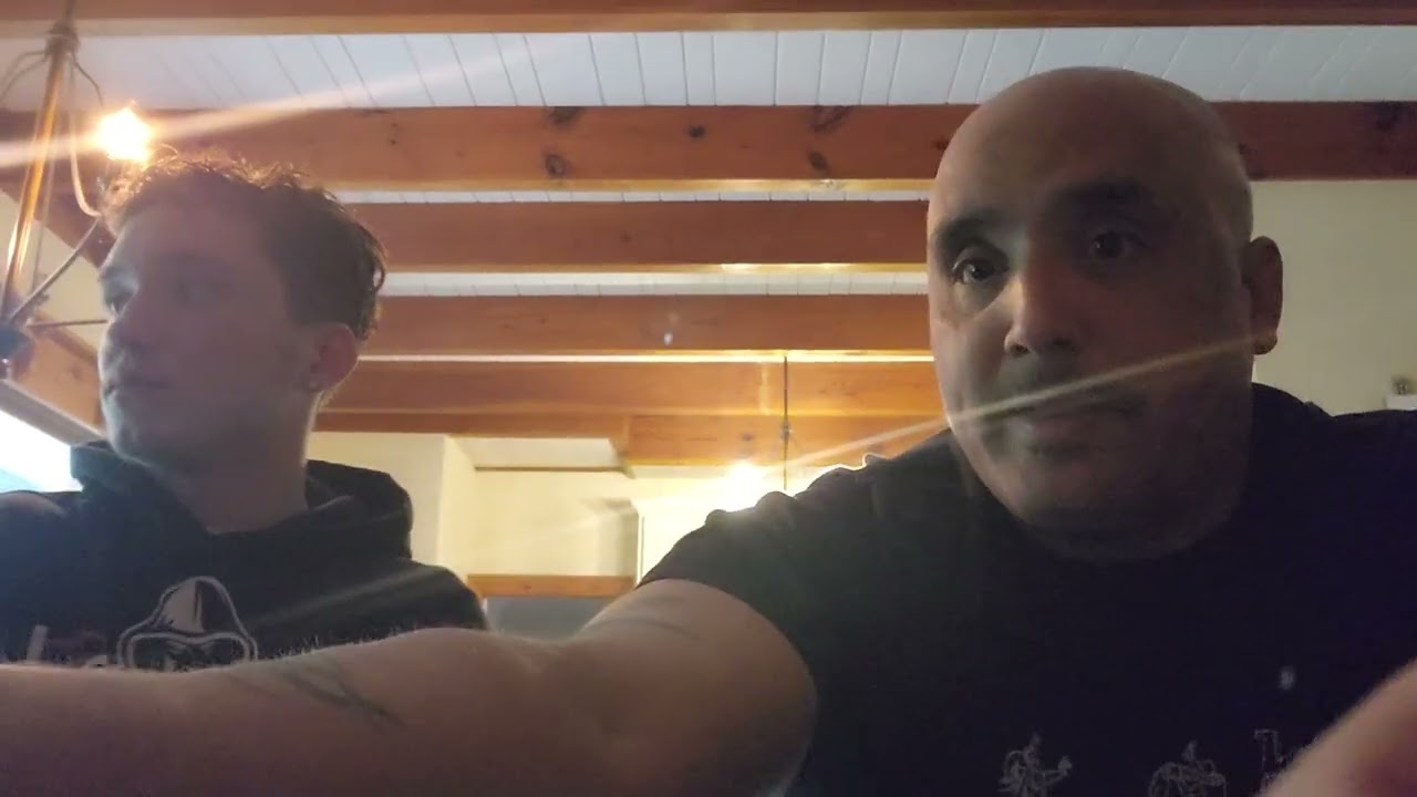 a sitdown with MAN IN THE MIRROR background