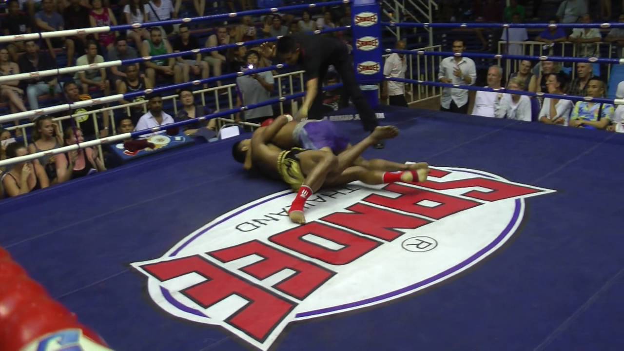 Punnya (red corner- Sinbi Muay Thai) fights at Bangla stadium 20.5.2016 backdrop
