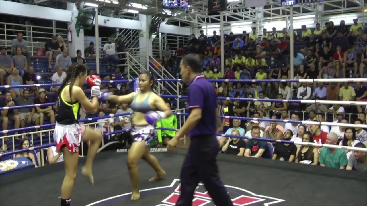 Florencia (Sinbi Muay Thai- Red Corner) fights at Bangla Boxing Stadium- 22.03.2017. backdrop