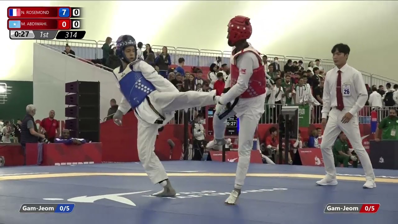 314 Round of 32 Men 63kg FRA N ROSEMOND SOM M ABDIWAHI background